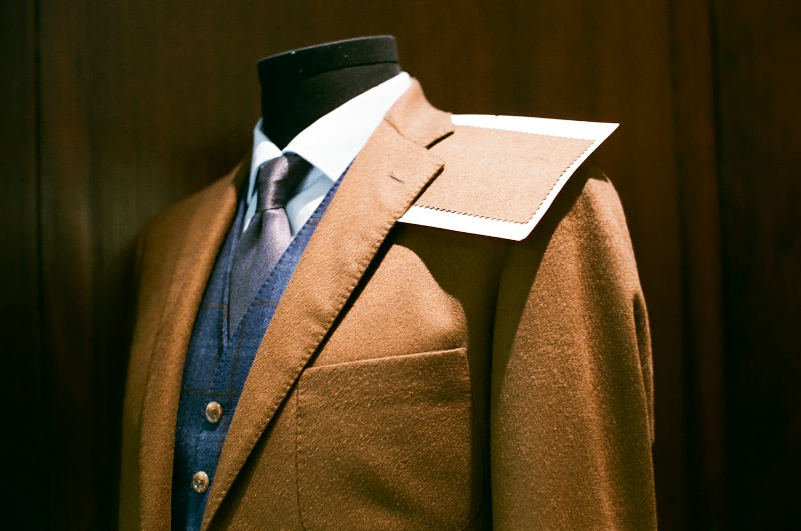 A tailored jacket on a dress form